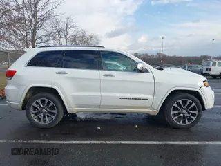 2017 Jeep Grand Cherokee Overland with VIN 1C4RJFCG3HC804190, listed as a IAAI auction lot 41010723 with 98,768 mi miles. Bid and sale history available at carsss.com. Image 13.