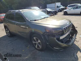 2020 Jeep Cherokee Limited with VIN 1C4PJMDX1LD587767, listed as a Copart auction lot 58844045 with 97,089 mi miles and Salvage title. Bid and sale history available at DreamBid. Image 4.