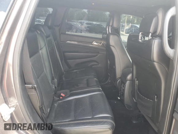 2017 Jeep Grand Cherokee Overland z VIN 1C4RJFCG1HC684826, wystawiony jako Copart lot #59971595 z przebiegiem 101 765 mil mil oraz Szkoda całkowita • Salvage title. Historia ofert i sprzedaży dostępna na DreamBid. Obrazek 11.