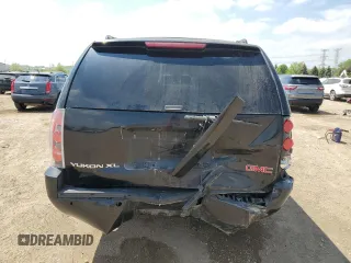 2007 GMC Yukon XL z VIN 1GKFK66847J150013, wystawiony jako Copart lot #56486435 z przebiegiem 225 570 mil mil oraz Szkoda całkowita • Salvage title. Historia ofert i sprzedaży dostępna na DreamBid. Obrazek 6.