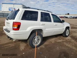 2004 Jeep Grand Cherokee Limited with VIN 1J4GW58N74C142578, listed as a Copart auction lot 43137315 with 93,934 mi miles and Salvage Title. Bid and sale history available at carsss.com. Image 3.
