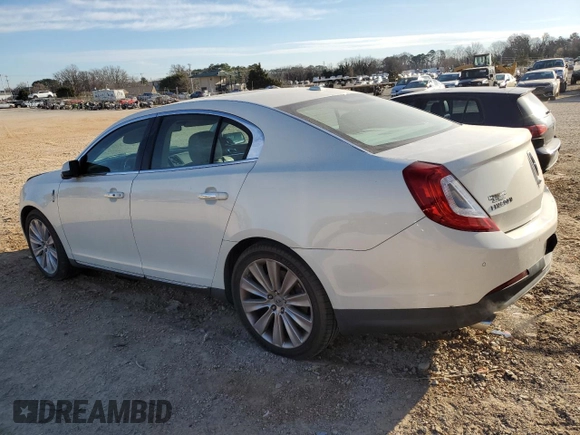 2013 Lincoln MKS EcoBoost with VIN 1LNHL9FTXDG604941, listed as a Copart auction lot 47445485 with 66,591 mi miles and Salvage title. Bid and sale history available at DreamBid. Image 2.
