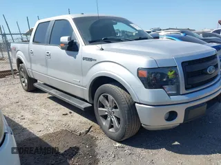 2014 Ford F-150 XL with VIN 1FTFW1CT5EKE30719, listed as a IAAI auction lot 42024407 with 215,004 mi miles and . Bid and sale history available at DreamBid. Image 1.