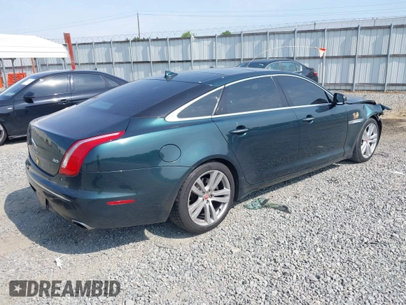 2014 Jaguar XJ Portfolio z VIN SAJWA2GZ4E8V60315, wystawiony jako IAAI lot #42293880 z przebiegiem 97 712 mil mil oraz . Historia ofert i sprzedaży dostępna na DreamBid. Obrazek 4.