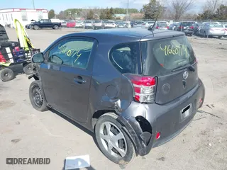 2012 Scion iQ with VIN JTNJJXB04CJ020060, listed as a IAAI auction lot 41660774 with 187,025 mi miles. Bid and sale history available at carsss.com. Image 3.