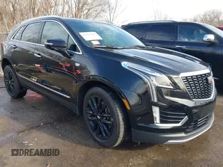 2021 Cadillac XT5 AWD Premium Luxury with VIN 1GYKNDRS0MZ135660, listed as a IAAI auction lot 41123089 with 26,361 mi miles. Bid and sale history available at carsss.com. Image 1.