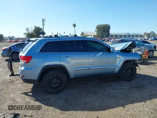2012 Jeep Grand Cherokee Limited z VIN 1C4RJFBTXCC341813, wystawiony jako IAAI lot #41791662 z przebiegiem 120 811 mil mil oraz . Historia ofert i sprzedaży dostępna na DreamBid. Obrazek 14.