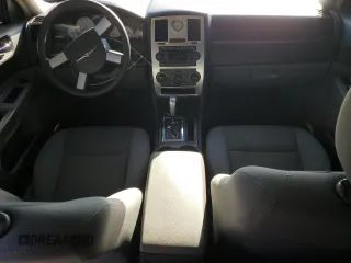2005 Chrysler 300 with VIN 2C3JA43R95H168570, listed as a Copart auction lot 87672695 with 82,171 mi miles and Salvage Title. Bid and sale history available at carsss.com. Image 8.