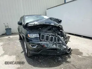 2021 Jeep Grand Cherokee Laredo X z VIN 1C4RJEAG0MC679608, wystawiony jako Copart lot #60989265 z przebiegiem 55 008 mil mil oraz Nie do naprawy • Non repairable. Historia ofert i sprzedaży dostępna na DreamBid. Obrazek 14.