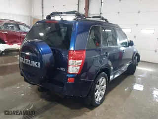 2012 Suzuki Grand Vitara Limited with VIN JS3TD0D76C4100790, listed as a IAAI auction lot 41716479 with 107,102 mi miles. Bid and sale history available at carsss.com. Image 4.
