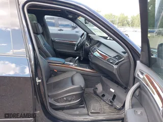 2011 BMW X5 35i with VIN 5UXZV4C53BL743050, listed as a IAAI auction lot 40074369 with 118,970 mi miles. Bid and sale history available at carsss.com. Image 5.