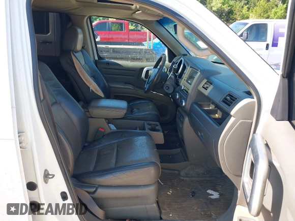 2006 Honda Ridgeline RTL with VIN 2HJYK16506H562857, listed as a IAAI auction lot 42169379 with 154,194 mi miles. Bid and sale history available at carsss.com. Image 5.