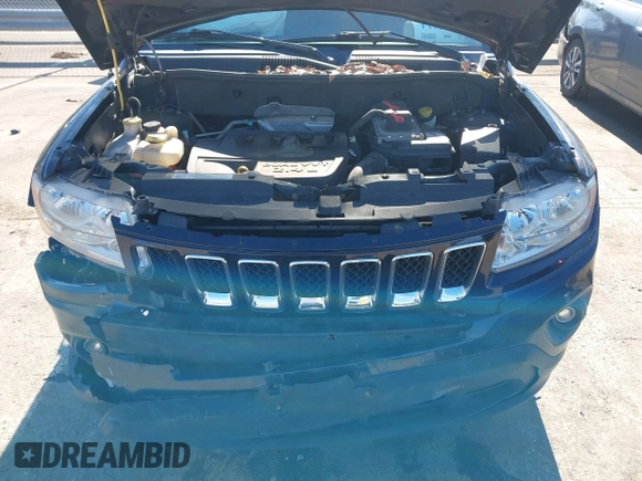 2011 Jeep Compass with VIN 1J4NF1FB6BD180447, listed as a IAAI auction lot 41575014 with 130,694 mi miles. Bid and sale history available at carsss.com. Image 10.