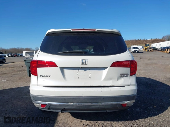 2016 Honda Pilot Touring with VIN 5FNYF6H98GB017079, listed as a IAAI auction lot 42055272 with 142,726 mi miles and . Bid and sale history available at DreamBid. Image 17.