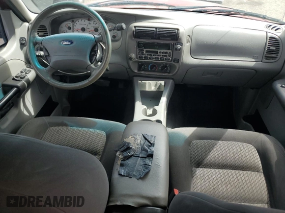 2003 Ford Explorer Sport Trac XLS z VIN 1FMZU67EX3UA71831, wystawiony jako Copart lot #57167025 z przebiegiem 145 290 mil mil oraz Szkoda całkowita • Salvage title. Historia ofert i sprzedaży dostępna na DreamBid. Obrazek 8.