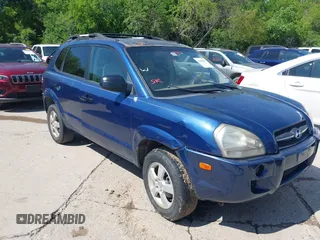 2006 Hyundai Tucson GL with VIN KM8JM12B06U386154, listed as a IAAI auction lot 41989899 with 168,069 mi miles. Bid and sale history available at carsss.com. Image 1.