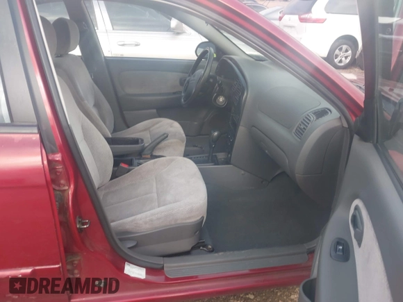 2003 Kia Spectra z VIN KNAFB121X35293054, wystawiony jako IAAI lot #42274932 z przebiegiem 108 978 mil mil oraz . Historia ofert i sprzedaży dostępna na DreamBid. Obrazek 5.