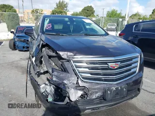 2018 Cadillac XT5 Luxury FWD with VIN 1GYKNCRS4JZ133643, listed as a IAAI auction lot 41916134 with 68,005 mi miles. Bid and sale history available at carsss.com. Image 1.