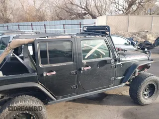 2009 Jeep Wrangler Unlimited Rubicon z VIN 1J4GA69159L749215, wystawiony jako IAAI lot #41489893 z przebiegiem 177 768 mil mil oraz . Historia ofert i sprzedaży dostępna na DreamBid. Obrazek 13.