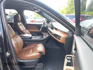 2020 Lincoln Aviator Grand Touring with VIN 5LMYJ8XY2LGL35999, listed as a IAAI auction lot 42344715 with 54,449 mi miles and . Bid and sale history available at DreamBid. Image 5.