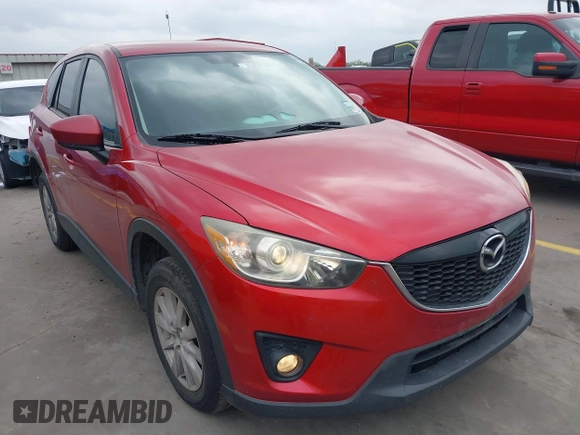 2015 Mazda CX-5 Touring with VIN JM3KE4CYXF0439953, listed as a IAAI auction lot 42124197 with 242,614 mi miles and . Bid and sale history available at DreamBid. Image 1.