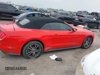 2017 Ford Mustang EcoBoost Premium z VIN 1FATP8UH6H5245140, wystawiony jako IAAI lot #41849107 z przebiegiem 52 672 mil mil oraz . Historia ofert i sprzedaży dostępna na DreamBid. Obrazek 13.