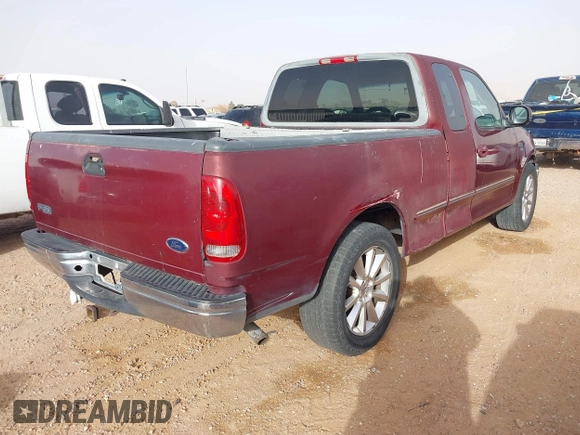 1998 Ford F-150 with VIN 1FTZX17WXWKB63416, listed as a IAAI auction lot 41604048 with 214,890 mi miles and . Bid and sale history available at DreamBid. Image 4.
