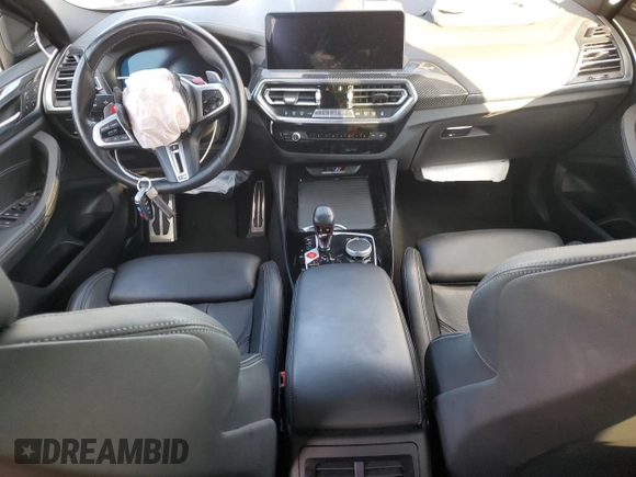 2022 BMW X4 M z VIN 5YM23EC00N9L35827, wystawiony jako Copart lot #87932635 z przebiegiem Nie podano mil oraz Szkoda całkowita • Salvage title. Historia ofert i sprzedaży dostępna na DreamBid. Obrazek 8.