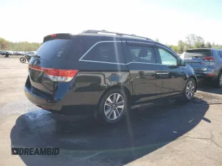 2014 Honda Odyssey Touring with VIN 5FNRL5H99EB088859, listed as a Copart auction lot 54828555 with 147,147 mi miles and Salvage Title. Bid and sale history available at DreamBid. Image 3.