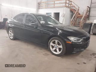 2014 BMW 3 Series 328i xDrive with VIN WBA3B3C5XEJ980450, listed as a IAAI auction lot 42078717 with 108,763 mi miles. Bid and sale history available at carsss.com. Image 1.