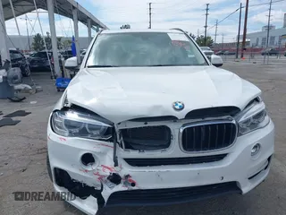 2016 BMW X5 sDrive35i with VIN 5UXKR2C55G0H43136, listed as a IAAI auction lot 41835931 with 125,751 mi miles. Bid and sale history available at carsss.com. Image 6.