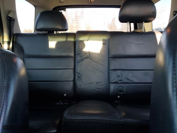 2004 Ford Escape Limited with VIN 1FMCU04184KA70257, listed as a Copart auction lot 89130575 with 186,430 mi miles and Salvage Title. Bid and sale history available at carsss.com. Image 10.