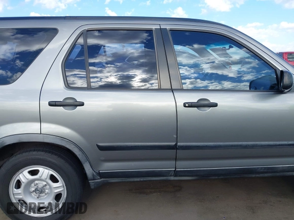 2006 Honda CR-V LX with VIN JHLRD68566C009990, listed as a IAAI auction lot 42024486 with 160,835 mi miles and . Bid and sale history available at DreamBid. Image 13.