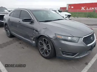 2013 Ford Taurus SHO z VIN 1FAHP2KT4DG164646, wystawiony jako IAAI lot #42274365 z przebiegiem 225 482 mil mil oraz . Historia ofert i sprzedaży dostępna na DreamBid. Obrazek 1.