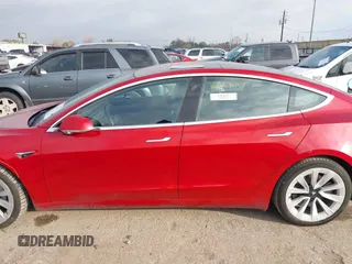 2018 Tesla Model 3 Long Range Battery with VIN 5YJ3E1EA8JF047298, listed as a IAAI auction lot 41403507 with 172,142 mi miles and . Bid and sale history available at DreamBid. Image 14.