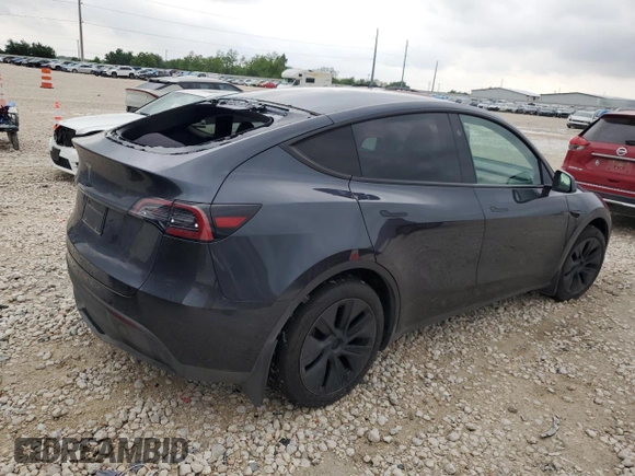 2024 Tesla Model Y with VIN 7SAYGDEDXRA322676, listed as a Copart auction lot 55664125 with 8,788 mi miles and Clean title. Bid and sale history available at DreamBid. Image 3.