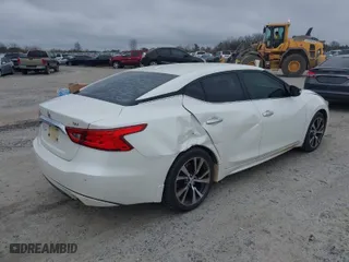 2016 Nissan Maxima 3.5 SL with VIN 1N4AA6AP2GC423595, listed as a IAAI auction lot 41490962 with 192,727 mi miles. Bid and sale history available at carsss.com. Image 4.