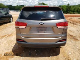 2017 Kia Sorento LX z VIN 5XYPG4A35HG297508, wystawiony jako Copart lot #56898275 z przebiegiem 137 498 mil mil oraz Szkoda całkowita • Salvage title. Historia ofert i sprzedaży dostępna na DreamBid. Obrazek 6.