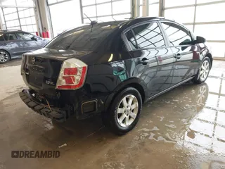 2007 Nissan Sentra 2.0 z VIN 3N1AB61E27L655448, wystawiony jako IAAI lot #41587772 z przebiegiem 184 202 mil mil oraz . Historia ofert i sprzedaży dostępna na DreamBid. Obrazek 4.