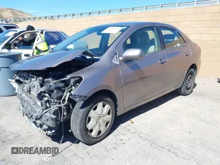 2009 Toyota Yaris with VIN JTDBT903591317892, listed as a IAAI auction lot 41682257 with 217,450 mi miles and . Bid and sale history available at carsss.com. Image 2.