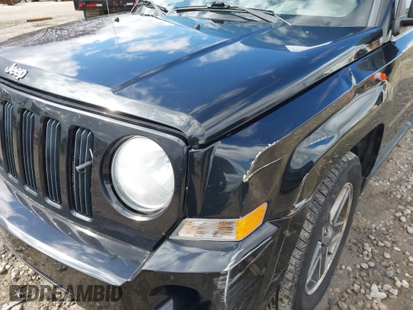 2008 Jeep Patriot Sport with VIN 1J8FF28WX8D775464, listed as a IAAI auction lot 42042232 with 158,428 mi miles and . Bid and sale history available at carsss.com. Image 6.
