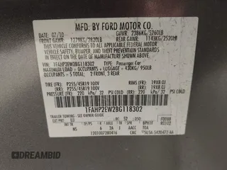 2011 Ford Taurus SEL with VIN 1FAHP2EW2BG118302, listed as a IAAI auction lot 41830053 with 188,163 mi miles. Bid and sale history available at carsss.com. Image 9.