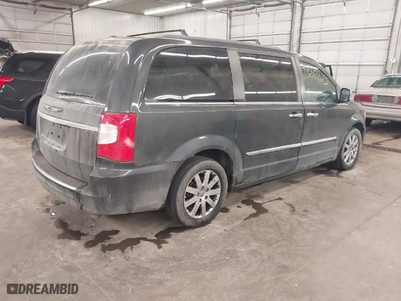 2011 Chrysler Town & Country Touring-L with VIN 2A4RR8DG5BR799358, listed as a IAAI auction lot 41650275 with 143,779 mi miles. Bid and sale history available at carsss.com. Image 4.
