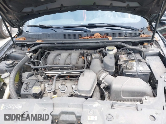 2013 Ford Taurus Limited with VIN 1FAHP2F84DG220283, listed as a IAAI auction lot 40045974 with 155,409 mi miles and . Bid and sale history available at DreamBid. Image 10.