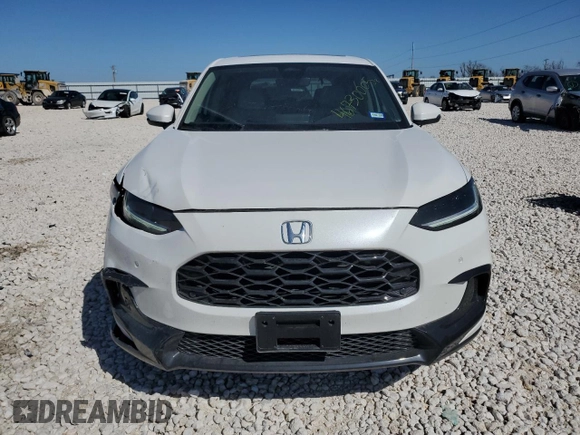 2025 Honda HR-V EX-L z VIN 3CZRZ1H77SM730034, wystawiony jako Copart lot #46730005 z przebiegiem 2644 mil mil oraz Szkody całkowita. Historia ofert i sprzedaży dostępna na DreamBid. Obrazek 5.