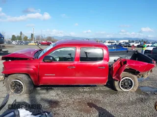 2015 Toyota Tacoma with VIN 3TMMU4FN1FM077045, listed as a IAAI auction lot 41670552 with 118,983 mi miles and . Bid and sale history available at DreamBid. Image 15.
