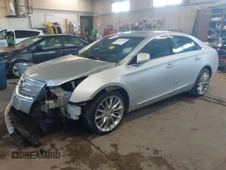 2013 Cadillac XTS Platinum with VIN 2G61V5S31D9190738, listed as a IAAI auction lot 41657461 with 136,924 mi miles and . Bid and sale history available at carsss.com. Image 18.
