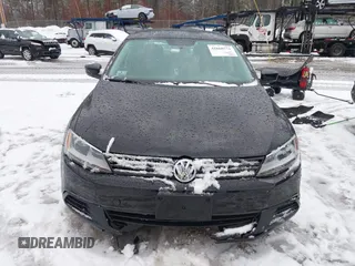 2014 Volkswagen Jetta Sedan S with VIN 3VW2K7AJ1EM217710, listed as a IAAI auction lot 41660771 with 73,680 mi miles. Bid and sale history available at carsss.com. Image 12.