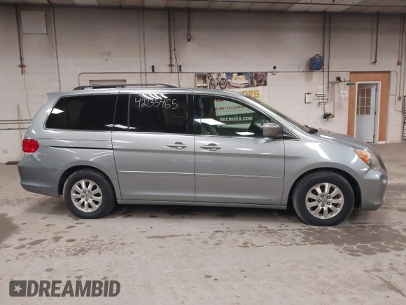 2009 Honda Odyssey EX-L with VIN 5FNRL38789B015524, listed as a IAAI auction lot 42135465 with 242,005 mi miles. Bid and sale history available at carsss.com. Image 14.