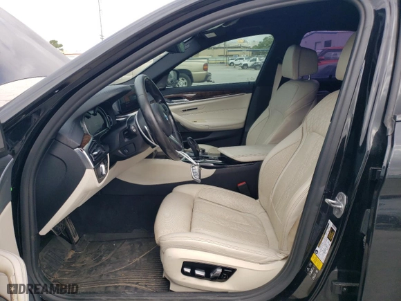 2018 BMW 5 Series M550i xDrive with VIN WBAJB9C57JB034918, listed as a Copart auction lot 51668675 with 94,492 mi miles and Clean Title. Bid and sale history available at carsss.com. Image 7.